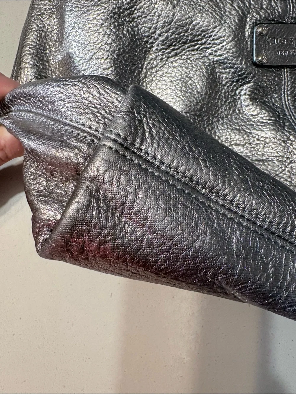 Kate Spade Janaya shiny silver hobo bag